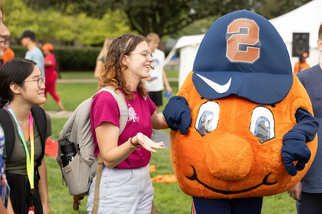 Students standing with Otto.